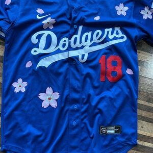 Genuine Merchandise Blue Jersey with Floral Accents